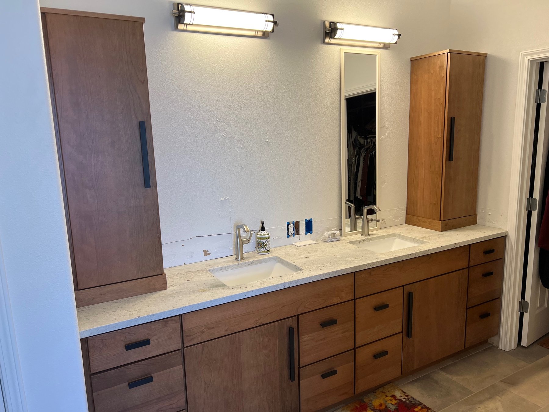 Wood double vanity with framed mirrors